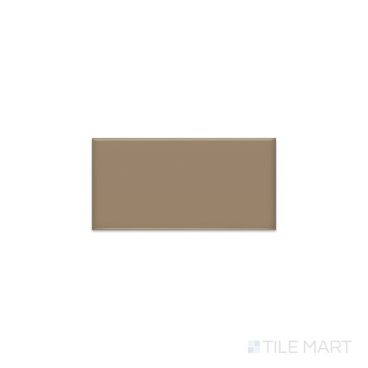 Slanted perspective of Color Wheel Classic Elemental Tan 3x6 glossy glazed ceramic tile, emphasizing a warm earthy tone, a radiant glossy finish, and a contemporary rectangular profile.  