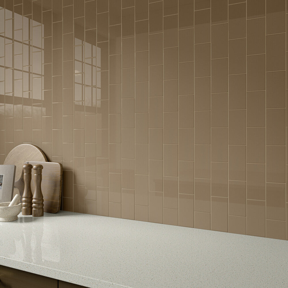Styled for subtle sophistication, the Color Wheel Classic Elemental Tan 3x6 glossy glazed ceramic tile delivers a smooth, natural tone with glossy refinement.