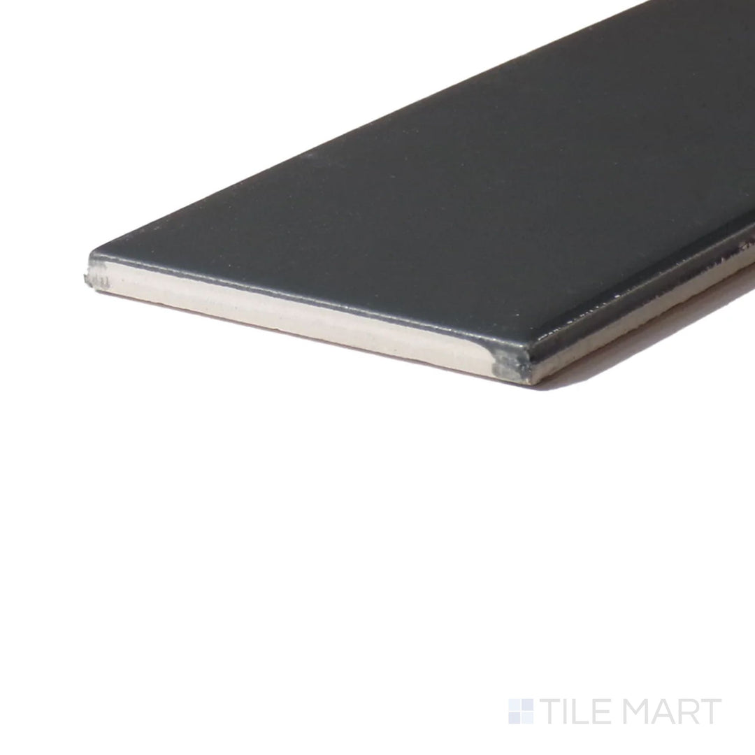 Corner angle of Color Wheel Classic Chalkboard 3X6 Glossy Glazed Ceramic, emphasizing its deep black tone and glossy finish that adds depth to any space.