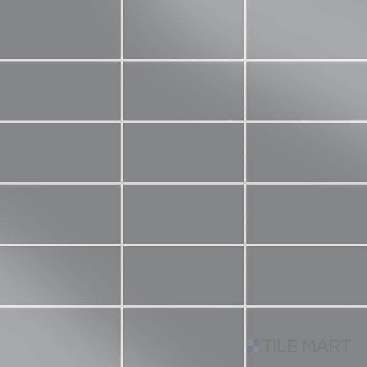 The overhead perspective highlights the Color Wheel Classic Suede Gray 3x6 glossy glazed ceramic tile, with its soft gray hue and glossy finish offering a sleek, contemporary appeal.