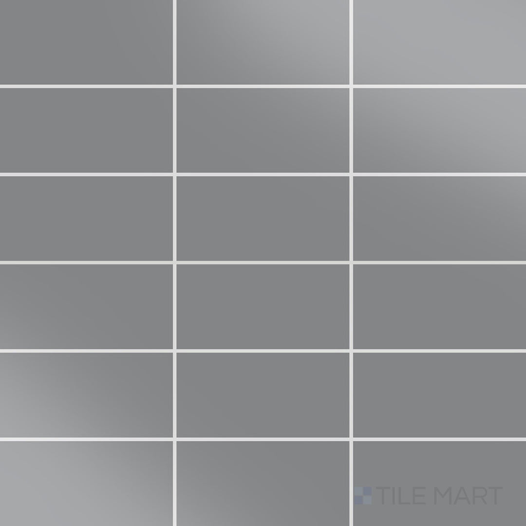 The overhead perspective highlights the Color Wheel Classic Suede Gray 3x6 glossy glazed ceramic tile, with its soft gray hue and glossy finish offering a sleek, contemporary appeal.