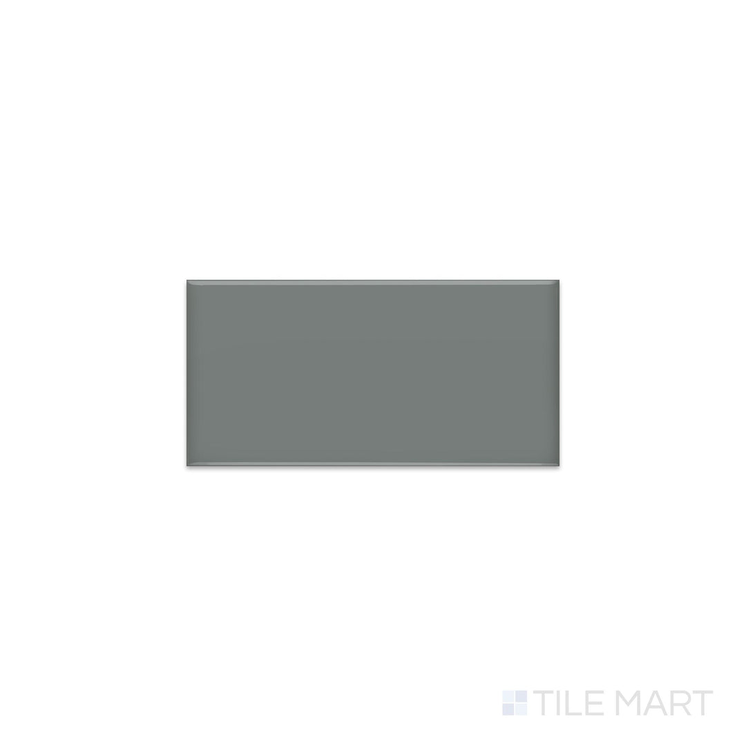 Diagonal view of Color Wheel Classic Suede Gray 3x6 glossy glazed ceramic tile, showcasing a soft gray tone with a high-gloss finish and an elongated rectangular format.  