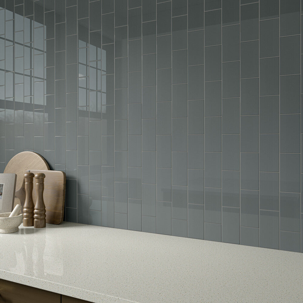 Roomscene with Color Wheel Classic Suede Gray 3x6 glossy glazed ceramic tile, revealing a soft gray tone and sleek finish that adds modern warmth to the layout.