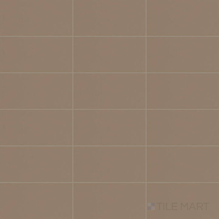 A top-down view of the Color Wheel Classic Elemental Tan 3x6 matte glazed ceramic tile highlights a warm, earthy tan tone with a smooth, non-reflective finish, perfect for creating a natural, inviting ambiance.