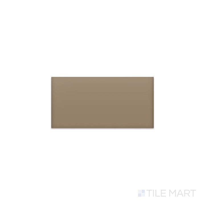 Angled shot of Color Wheel Classic Elemental Tan 3x6 matte glazed ceramic tile, featuring a soft tan tone with a contemporary matte finish in a timeless subway tile format.  