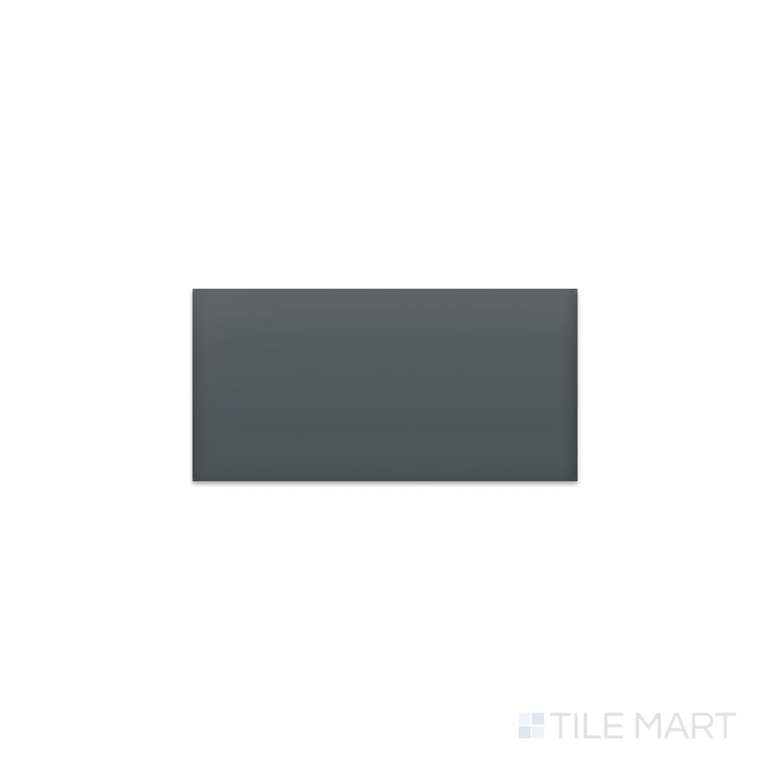 Diagonal view of Color Wheel Classic Chalkboard 3x6 matte glazed ceramic tile, showcasing a deep black shade with a non-glossy, smooth finish and a modern subway-style design.  