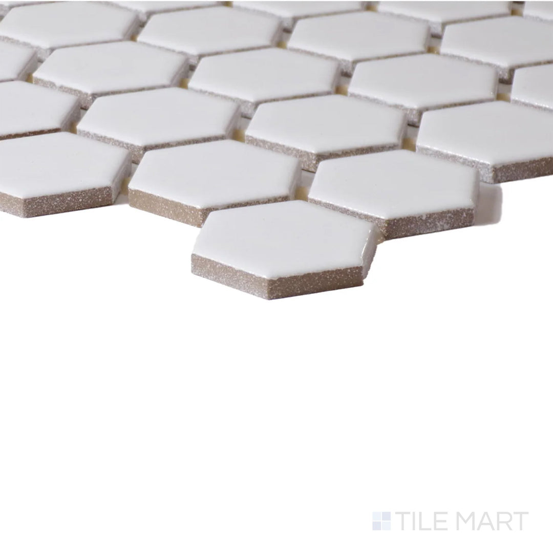 Corner view of Color Wheel Mosaic Arctic White 1.5" Hexagon Glossy Glazed Ceramic, emphasizing its bright white finish and sleek hexagonal pattern.
