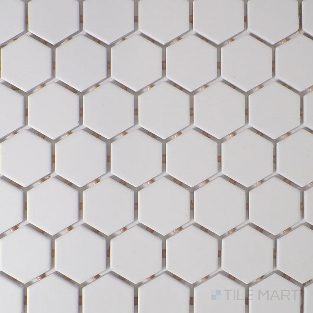 Viewed from the top, the Color Wheel Mosaic Arctic White 1.5" hexagon matte glazed ceramic tile displays a clean, bright white shade with a soft, non-glossy surface, perfect for minimalist and contemporary spaces.