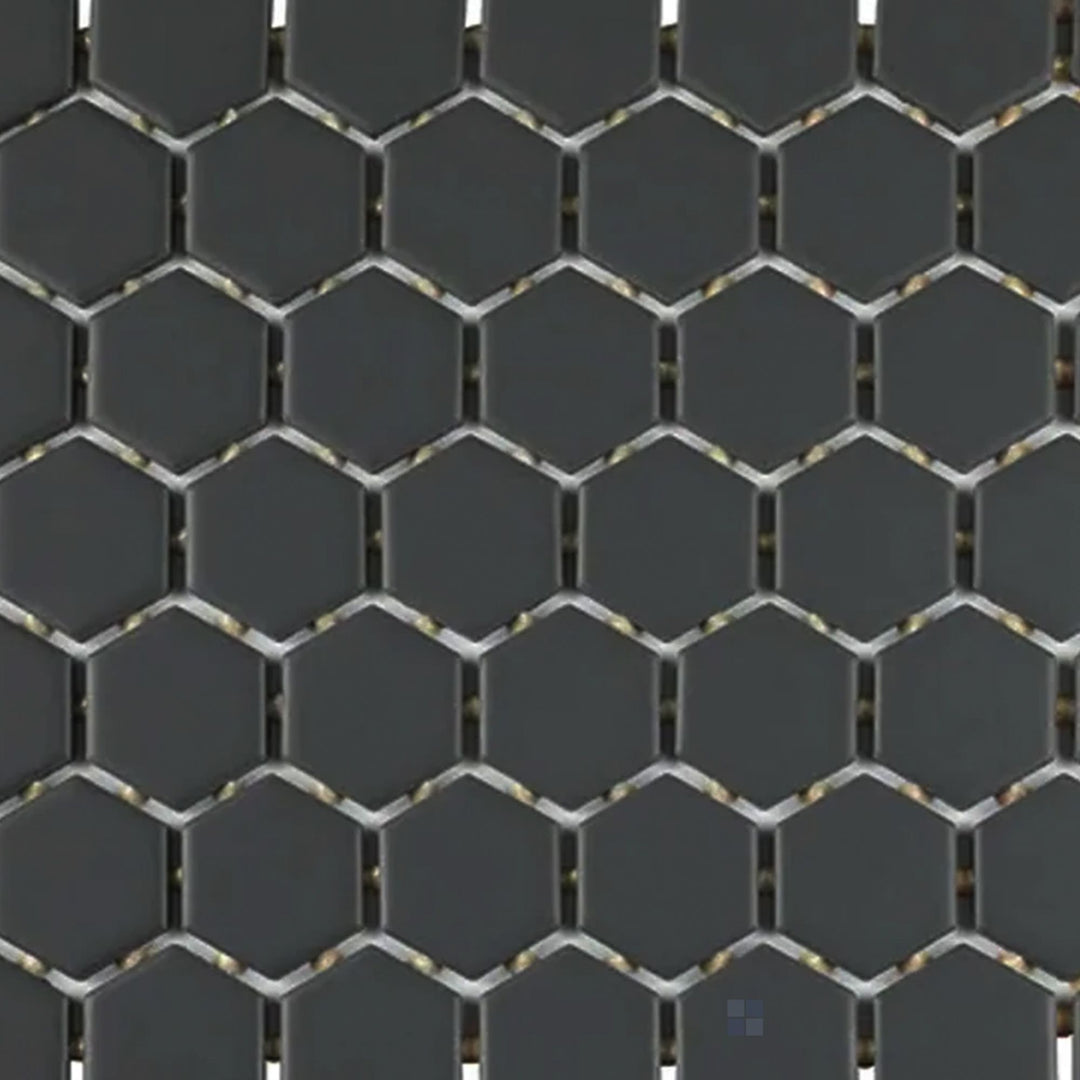 Captured from above, the Color Wheel Mosaic Chalkboard 1.5" hexagon matte glazed ceramic tile showcases a deep, rich black tone with a velvety surface, bringing depth and contrast to any space.