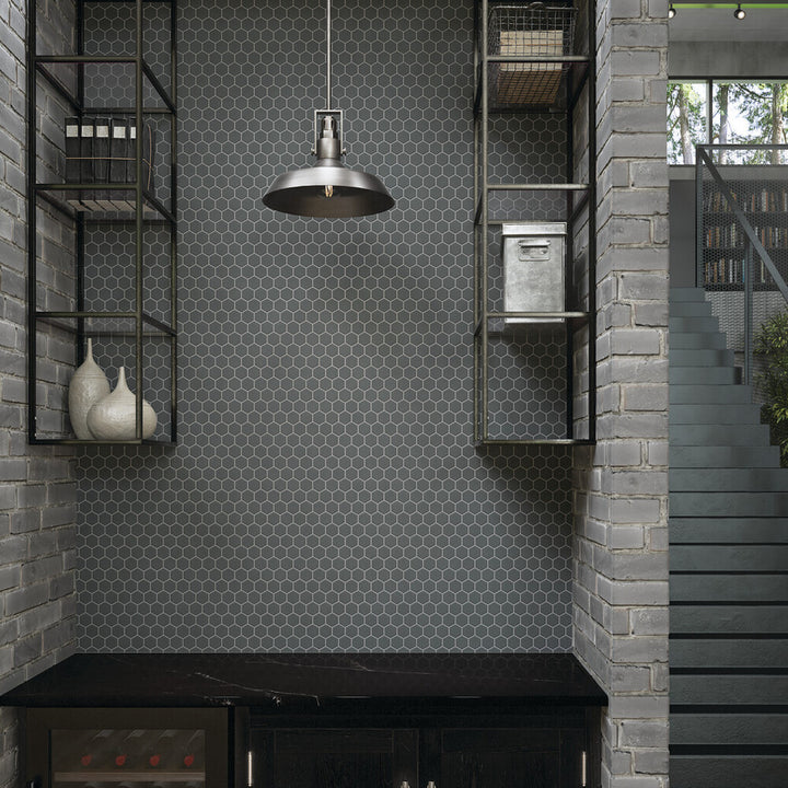 With a bold matte finish and graphic shape, the Color Wheel Mosaic Chalkboard 1.5" hexagon ceramic tile brings modern edge and texture to this roomscene.