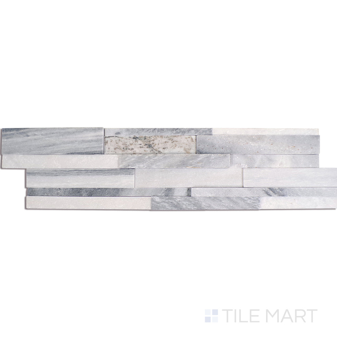 Angled shot of ALASKA GRAY 3D HONED 6x24 PANEL  MARBLE PANEL with a HONED finish, revealing the depth of the product with a skewed visual perspective.