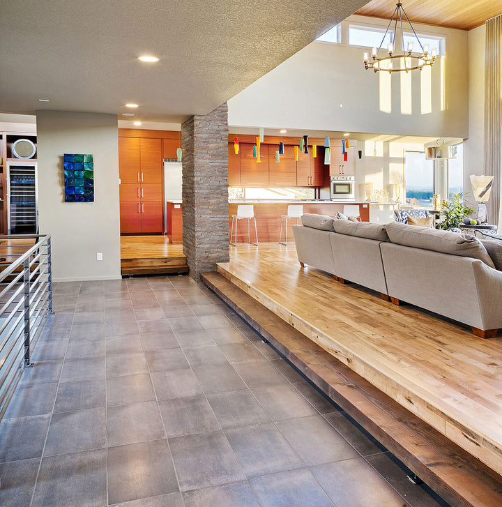 Displaying the refined texture of AMBER FALLS LEDGER CORNER QUARTZITE PANEL with a SPLITFACE finish, providing a durable yet stylish look to the interior.