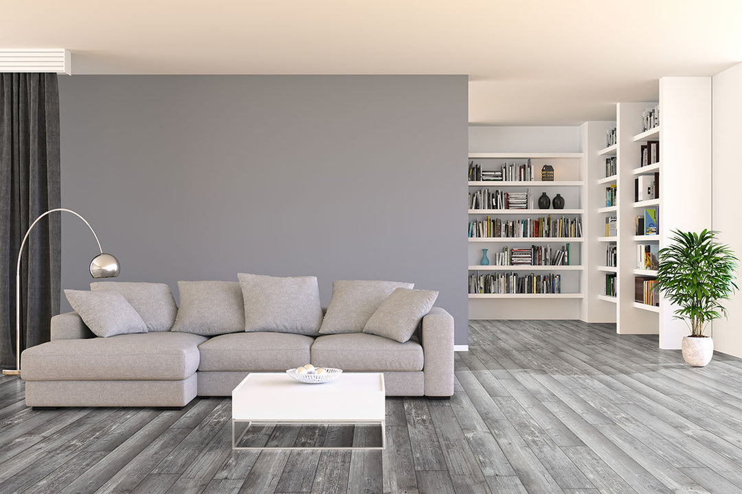 Soft gray wood tones and realistic textures create a cool and modern aesthetic, seamlessly integrating into contemporary interiors with Andover Kingsdown Gray 7x48 low gloss luxury plank vinyl.