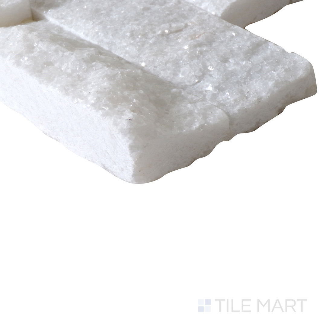 Corner shot of Rockmount ARCTIC WHITE MINI PANEL MARBLE PANEL with a SPLITFACE finish, demonstrating the sturdy material and its subtle layering at the corner.