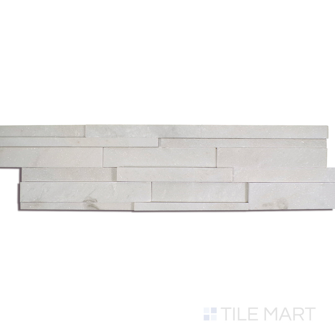 Angled shot of ARCTIC WHITE 3D HONED 6x24 PANEL  MARBLE PANEL with a HONED finish, highlighting the intricate details and elegant finish from a unique perspective.