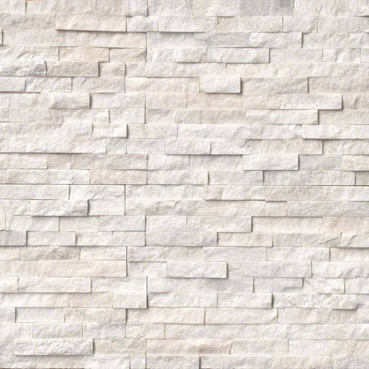 Top-down view of ARCTIC WHITE 6x24 PANEL  MARBLE PANEL in SPLITFACE finish, displaying the surface and subtle tonal variations.