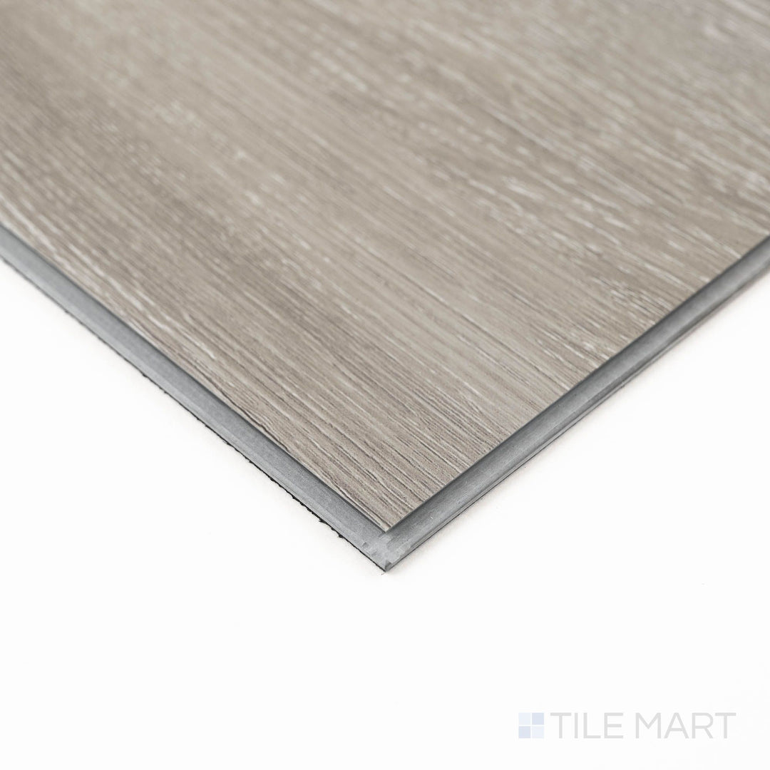 Close-up corner shot of Ashton Loton Hill 7X48 Low Gloss Luxury Vinyl Plank, showcasing edge detail and surface texture.