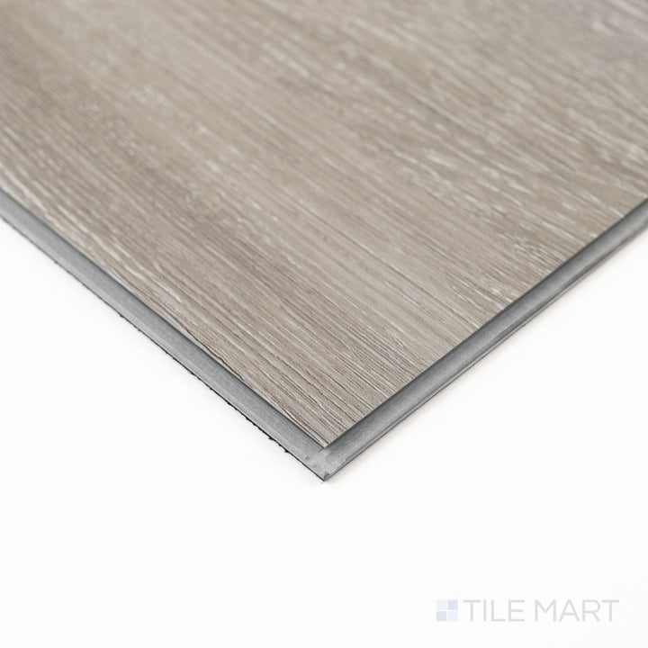 Close-up corner shot of Ashton Loton Hill 7X48 Low Gloss Luxury Vinyl Plank, showcasing edge detail and surface texture.