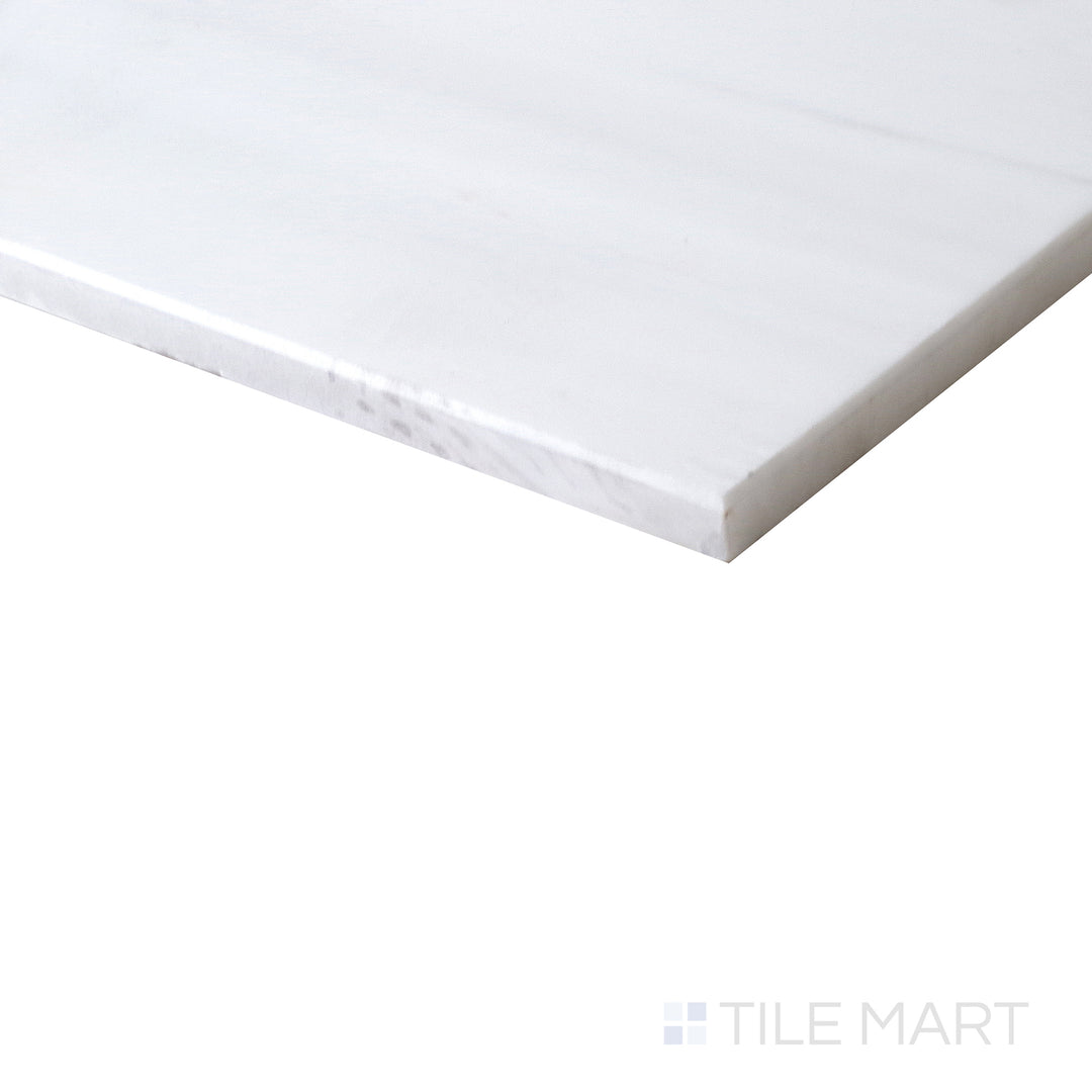 Corner shot of BIANCO DOLOMITE 12X24 HONED MARBLE TILE with a HONED finish, displaying the product's strong structure and nuanced texture from the corner.