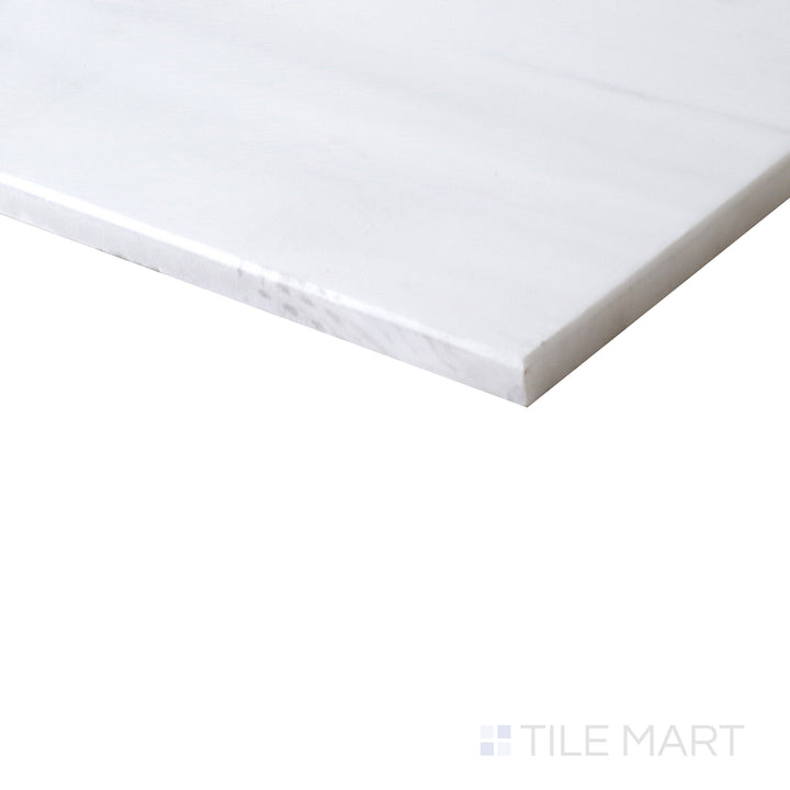 Corner shot of BIANCO DOLOMITE 12X24 POLISHED MARBLE TILE with a POLISHED finish, showing the robust material and finely finished edge through a focused corner view.