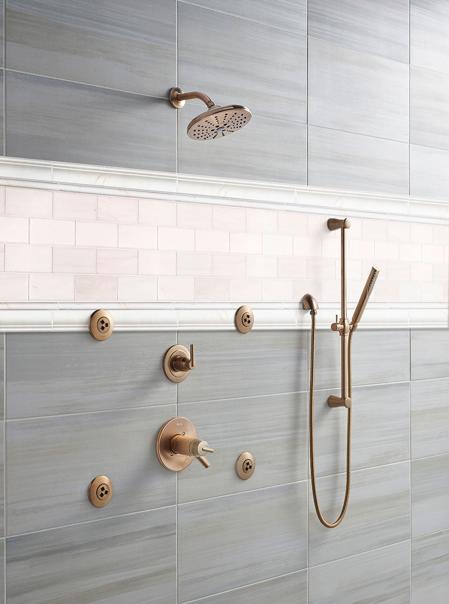 A refined and polished appearance with Bianco Dolomite 3X6 Polished Marble, featuring soft white tones and subtle gray veining for a timeless appeal.