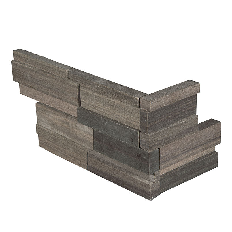 Top-down view of BROWN WAVE 3D HONED LEDGER CORNER SANDSTONE PANEL in HONED finish, highlighting the texture and detailed color patterns.