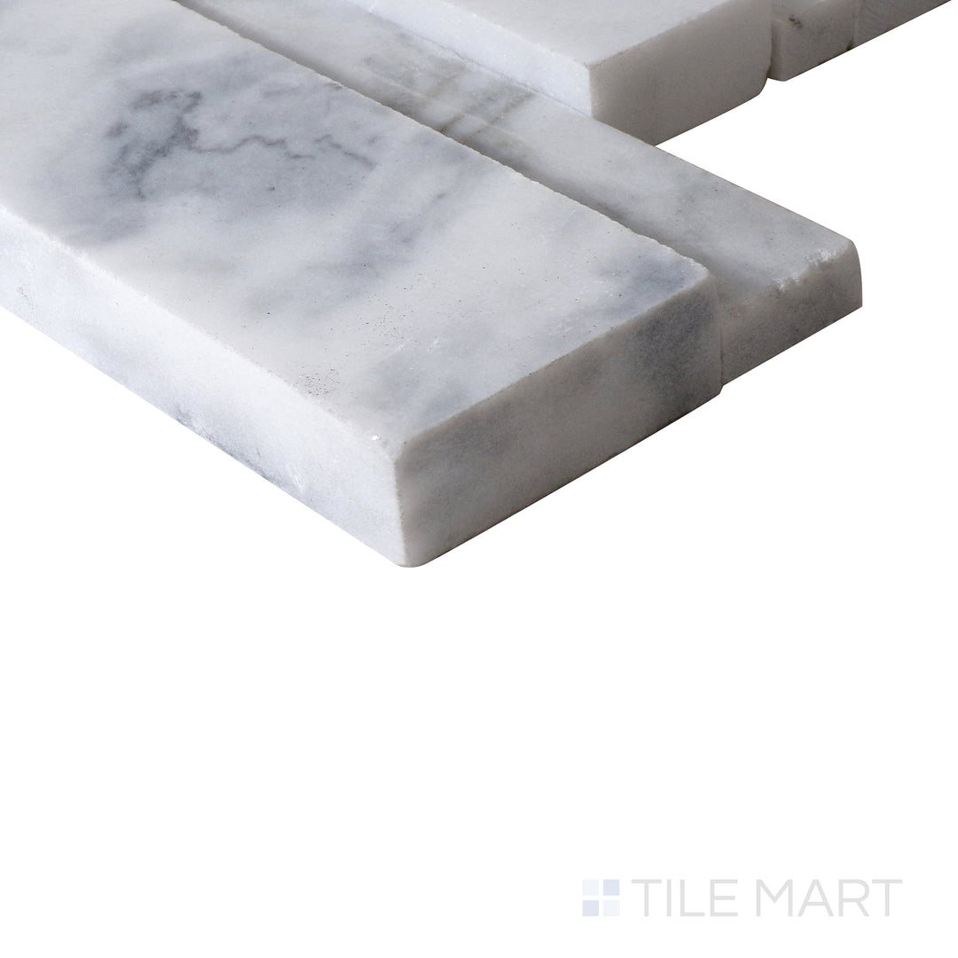 Corner shot of CALACATTA CRESSA 3D 6x24 PANEL  MARBLE PANEL with a HONED finish, emphasizing the layered construction and the product's distinct edge design.