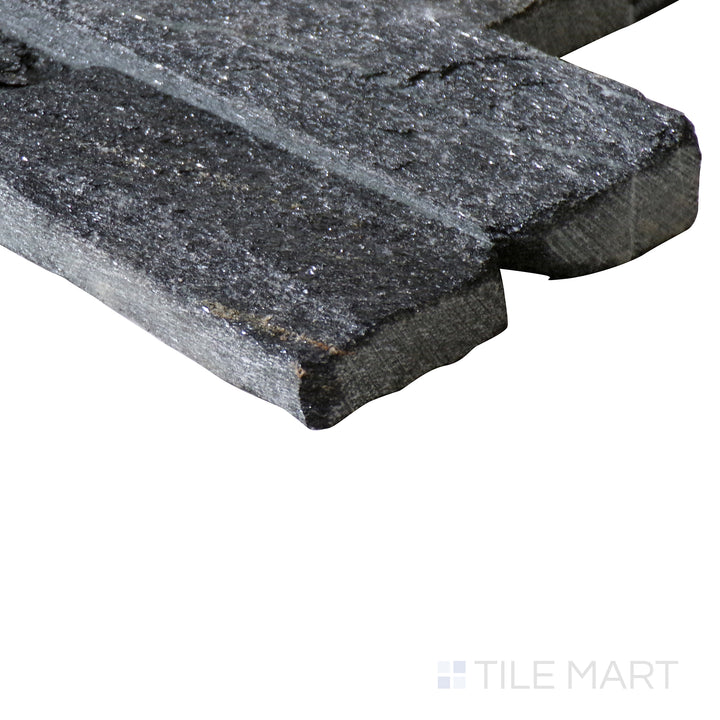 Corner shot of COAL CANYON 6x24 PANEL  QUARTZITE PANEL with a SPLITFACE finish, demonstrating the sturdy material and its subtle layering at the corner.