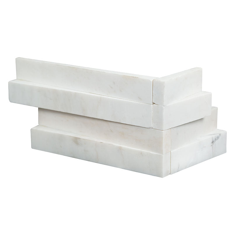 Top-down view of COSMIC WHITE 3D WAVE CORNER MARBLE PANEL in HONED finish, highlighting the texture and detailed color patterns.