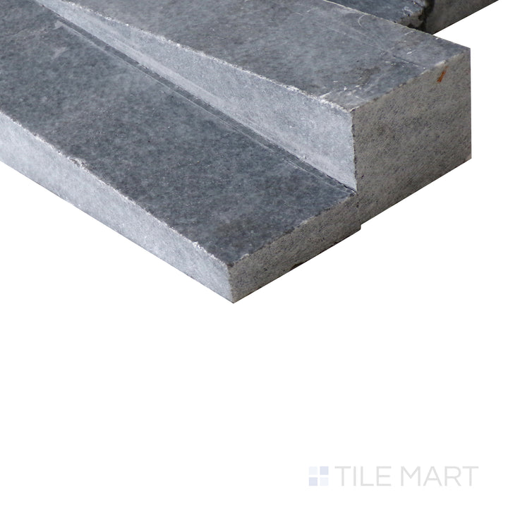 Corner shot of COSMIC BLACK 3D WAVE 6X24 PANEL MARBLE PANEL with a HONED finish, revealing the intricate edge detailing and thickness from a corner viewpoint.