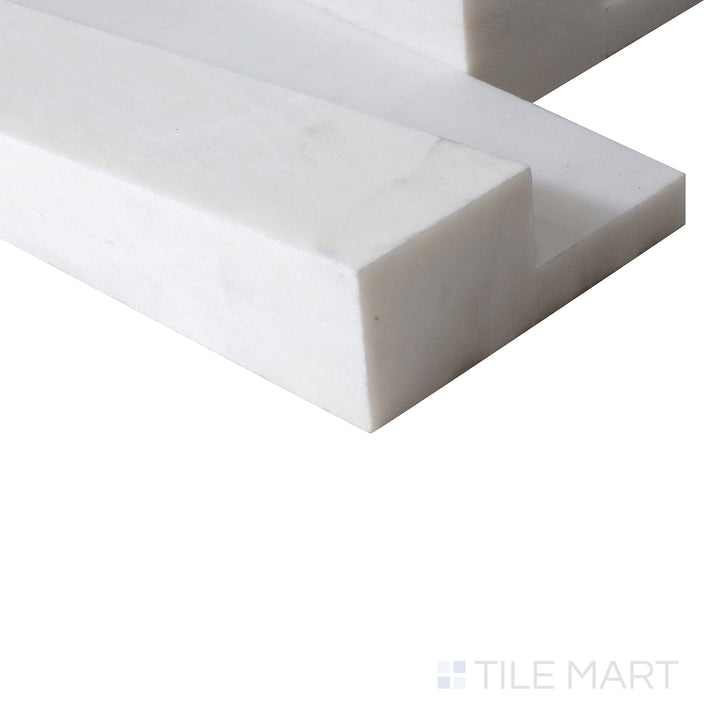 Corner shot of COSMIC WHITE 3D WAVE 6X24 PANEL MARBLE PANEL with a HONED finish, highlighting the precision of the product's edge and the substantial thickness.