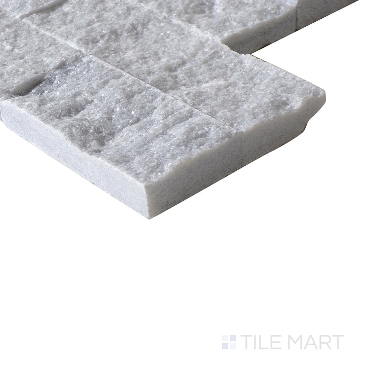 Corner shot of COSMIC GRAY SPLIT FACE 6X24 PANEL MARBLE PANEL with a SPLITFACE finish, displaying the product's strong structure and nuanced texture from the corner.