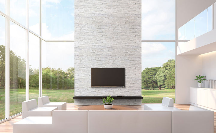 Showcasing the versatile design of COSMIC WHITE SPLIT FACE 6X24 PANEL MARBLE PANEL with a SPLITFACE finish, blending effortlessly with the surrounding modern elements.