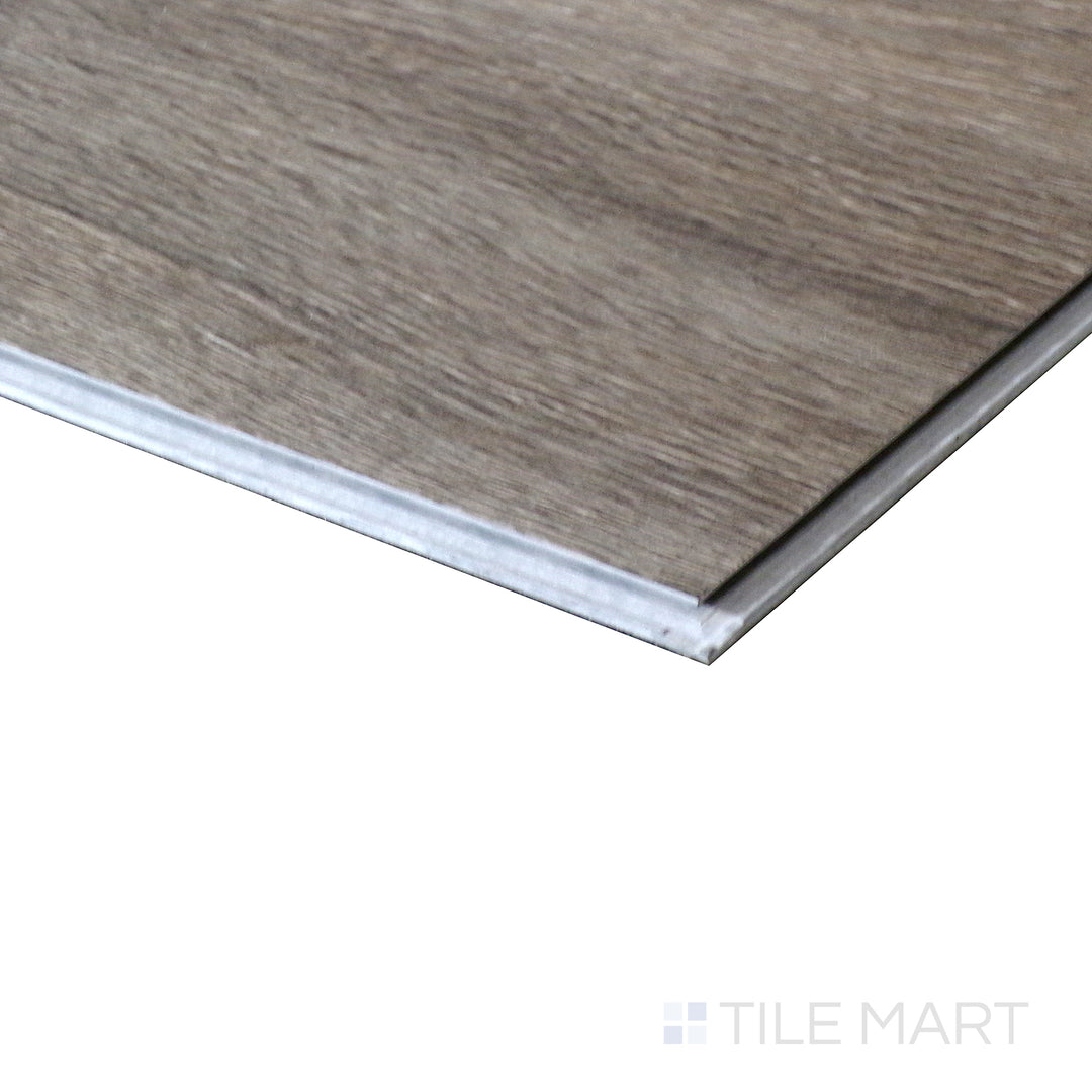 Corner shot of CYRUS BRACKEN HILL 7x48 VINYL TILE with a LOW GLOSS finish, capturing the thickness and material depth from an angled corner perspective.