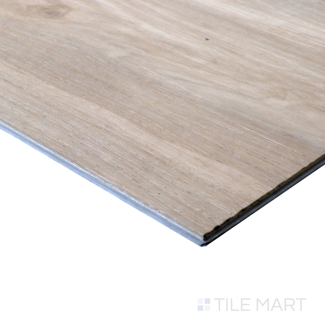 Corner shot of CYRUS CRANTON 7x48 VINYL TILE with a LOW GLOSS finish, highlighting the precision of the product's edge and the substantial thickness.