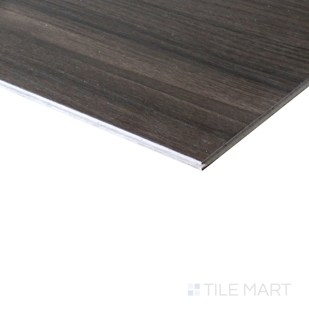 Corner shot of CYRUS JENTA 7x48 VINYL TILE with a LOW GLOSS finish, highlighting the precision of the product's edge and the substantial thickness.