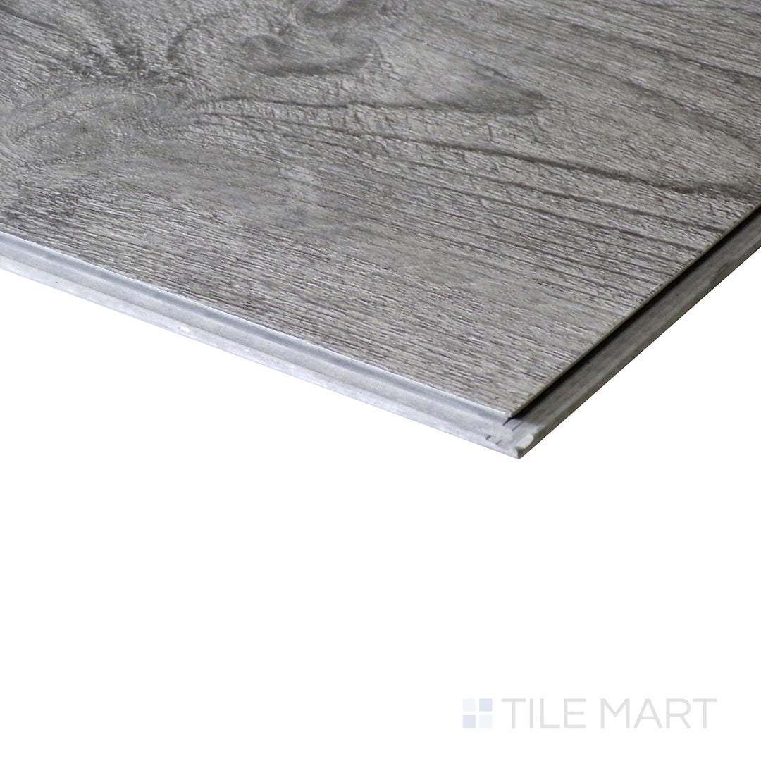 Corner shot of CYRUS MEZCLA 7x48 VINYL TILE with a LOW GLOSS finish, capturing the thickness and material depth from an angled corner perspective.