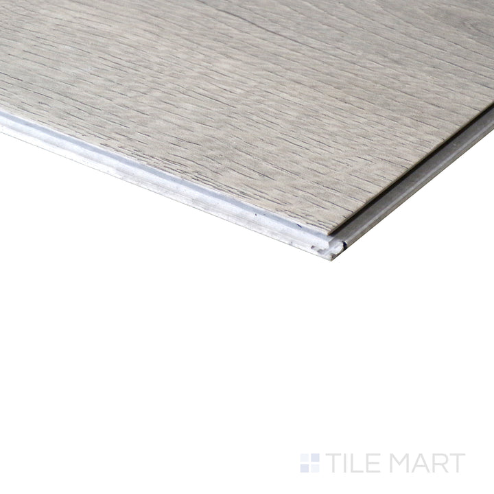 Corner shot of CYRUS RUNMILL ISLE 7x48 VINYL TILE with a LOW GLOSS finish, emphasizing the layered construction and the product's distinct edge design.