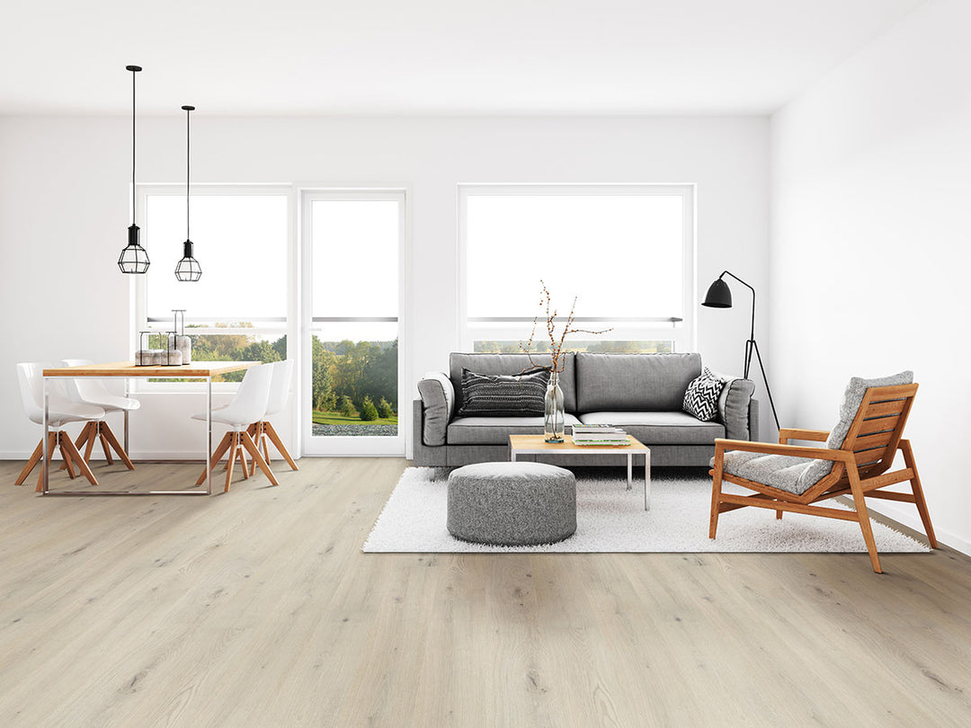 A coastal-inspired aesthetic with Cyrus Runmill Isle 7X48 Low Gloss Luxury Plank Vinyl, featuring soft beige hues and weathered wood textures.