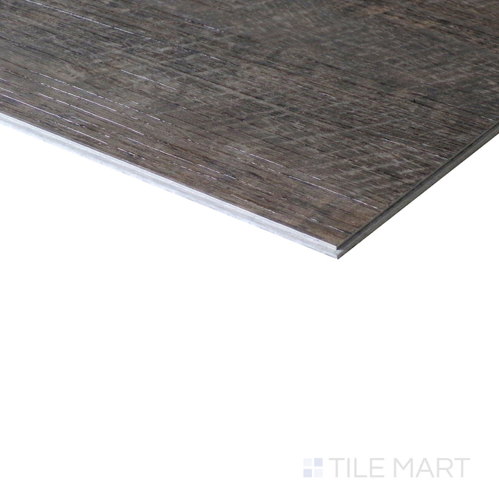 Corner shot of CYRUS STABLE 7x48 VINYL TILE with a LOW GLOSS finish, showing the robust material and finely finished edge through a focused corner view.