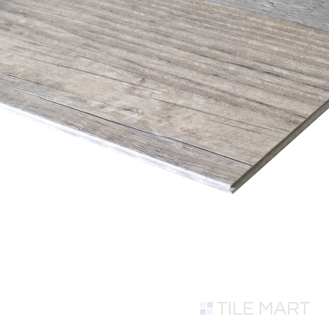 Corner shot of CYRUS WOBURN ABBEY 7x48 VINYL TILE with a LOW GLOSS finish, emphasizing the layered construction and the product's distinct edge design.