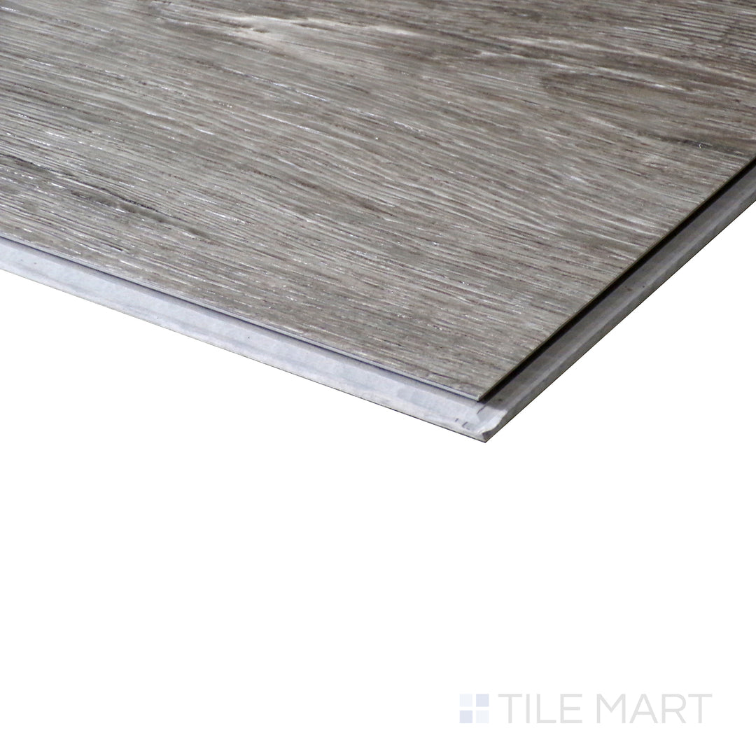 Corner shot of XL CYRUS KATELLA ASH  9x60 VINYL TILE with a LOW GLOSS finish, demonstrating the sturdy material and its subtle layering at the corner.