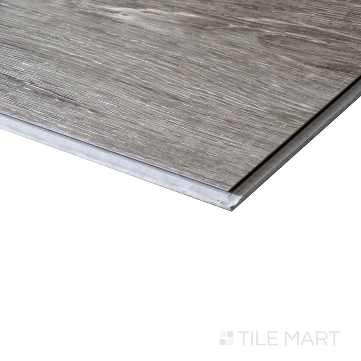 Corner shot of XL CYRUS KATELLA ASH  9x60 VINYL TILE with a LOW GLOSS finish, demonstrating the sturdy material and its subtle layering at the corner.