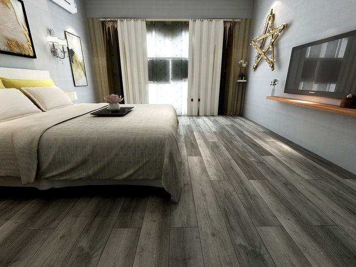 A sophisticated and natural wood-look plank, Cyrus Katella Ash 9X60 Low Gloss Luxury Plank Vinyl blends soft beige and ash tones with a realistic grain finish.