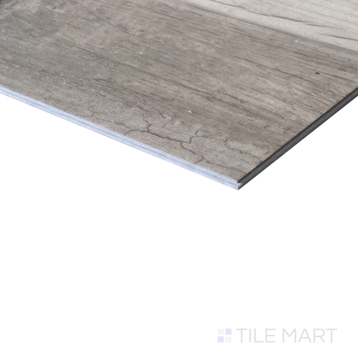 Corner shot of XL CYRUS WEATHERED BRINA 9x60 VINYL TILE with a LOW GLOSS finish, offering a close-up look at the product's durability and material thickness at the corner.