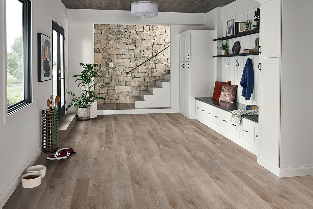 Sleek and modern space featuring Cyrus Whitfield Gray 9x60 low gloss luxury plank vinyl for a refined aesthetic.