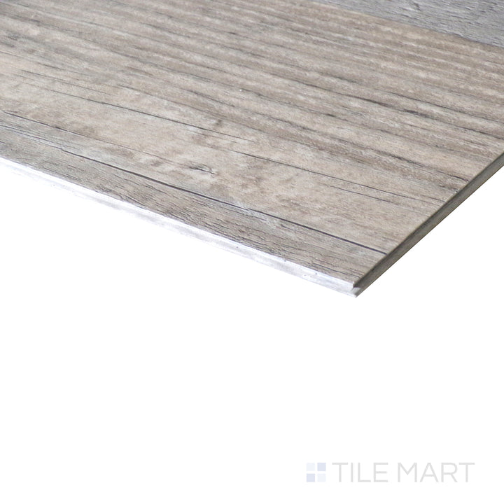 Corner shot of XL CYRUS WOBURN ABBEY 9x60 VINYL TILE with a LOW GLOSS finish, emphasizing the layered construction and the product's distinct edge design.