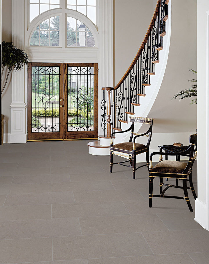 Emphasizing the beauty of DIMENSIONS GRIS 12X24 PORCELAIN TILE with a MATTE finish, adding a touch of warmth and texture to the space.