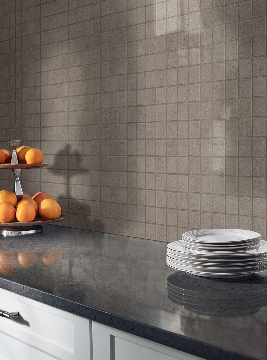 Displaying the refined texture of DIMENSIONS GRIS 2X2 MOSAIC PORCELAIN MOSAIC with a MATTE finish, providing a durable yet stylish look to the interior.