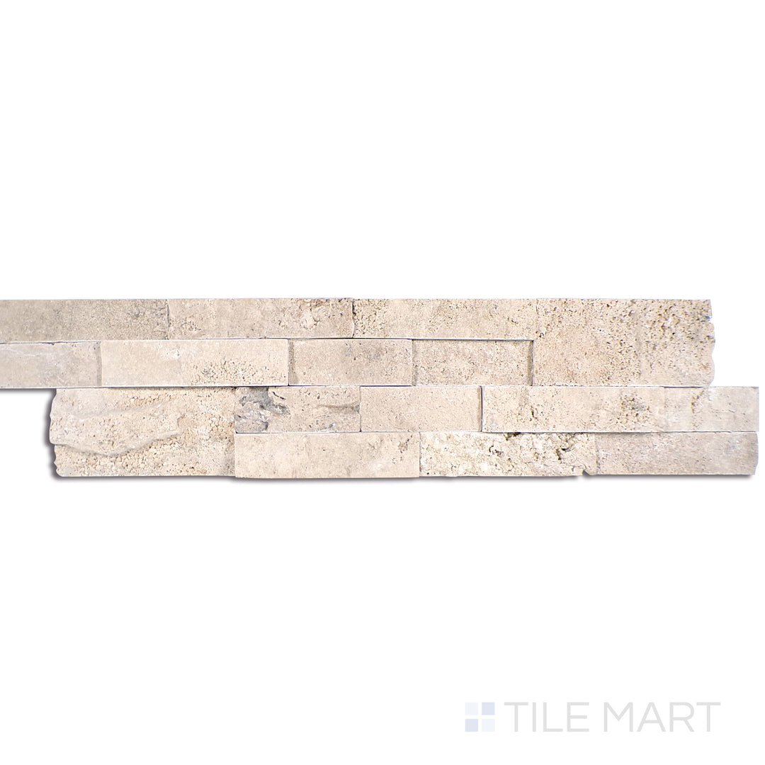 Angled shot of DURANGO CREAM SPLITFACE 6x24 PANEL  TRAVERTINE PANEL with a SPLITFACE finish, offering a detailed look at the material's finish with a tilted viewpoint.